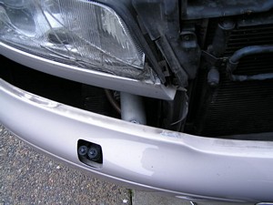 slide the bumper forward from the center