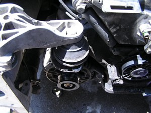 passenger side timing belt cover, first bolt-engine mount