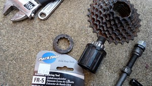 Crescent Wrench, locknut, shaft, freewheel hub, sprocket